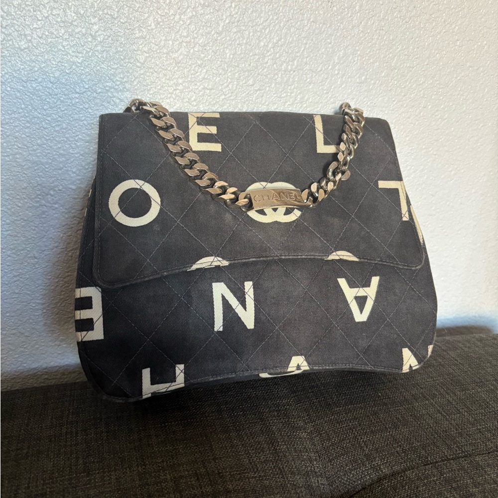 CHANEL Black and White Quilted Shoulder Bag with Chain Straps